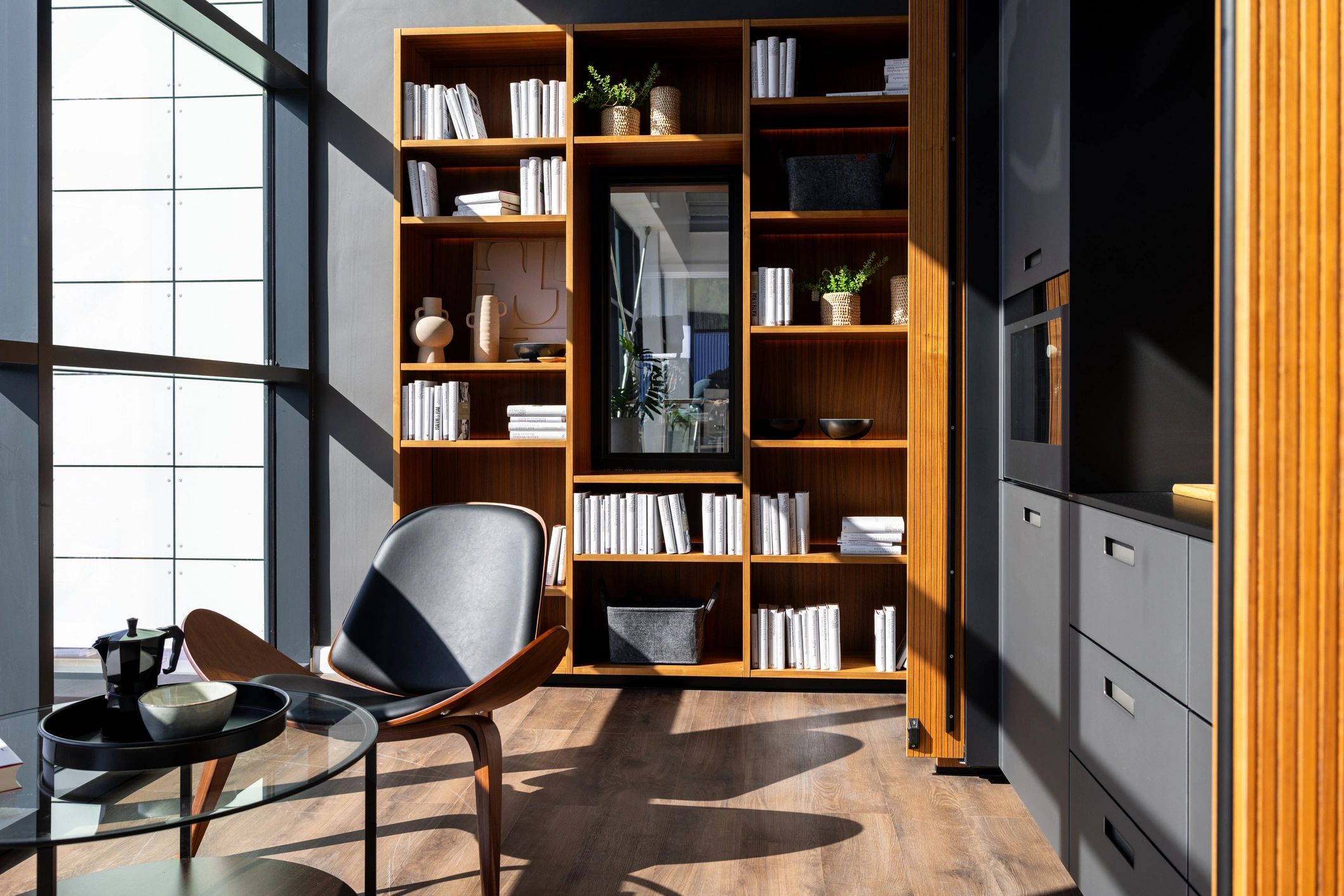 Quiet lounge and reading space inspired by the hotel's library atmosphere