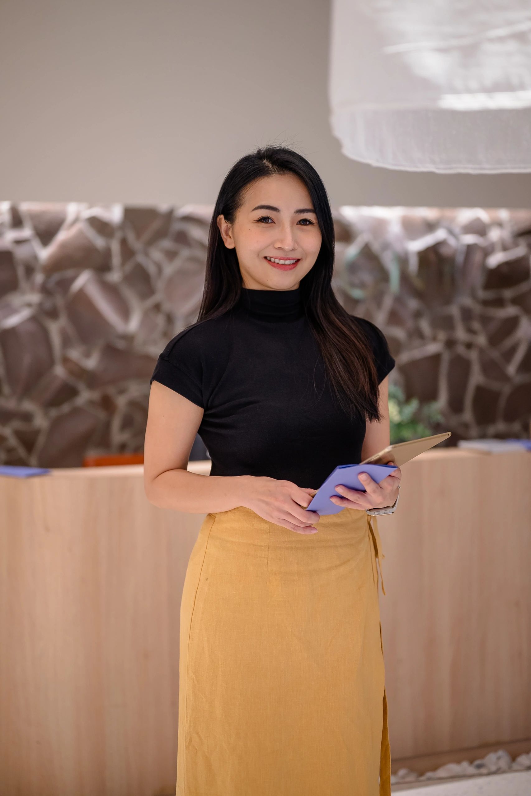 Portrait of Lina Chen, guest experience lead